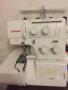 Продам оверлок (новый)Janome 210 D